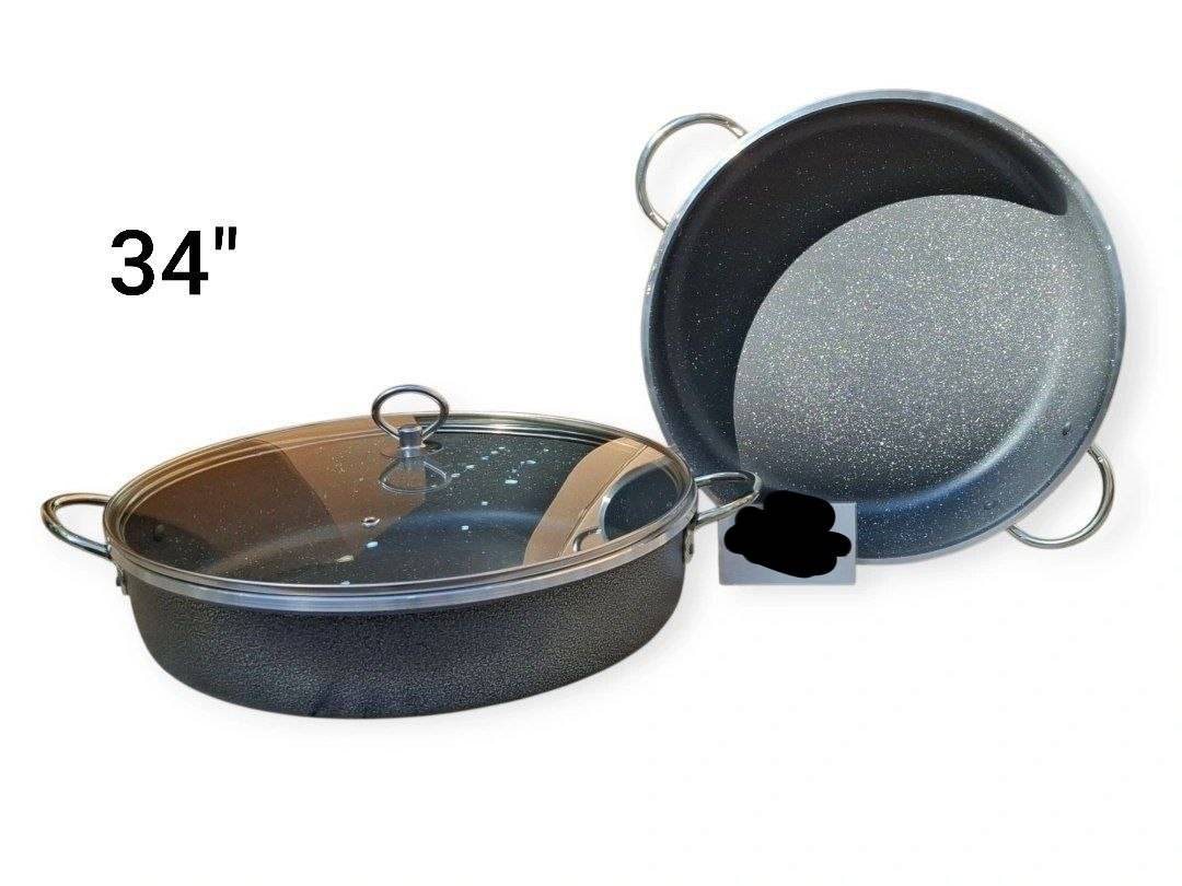 📌تابه تک دودسته طرح چدن ام سی _ mc  📏سایز 34"  📌پوشش داخل گرانیت نقره ای نسوز   ✅️دستگیره و قپه استیل ✅️درب لبه دار  ✅️وزن سنگین _ جنس ضخیم  ✅️گرانیت داخل ضد خش  ✅️دیواره بلند  🌈رنگبندی مشکی و چکشی